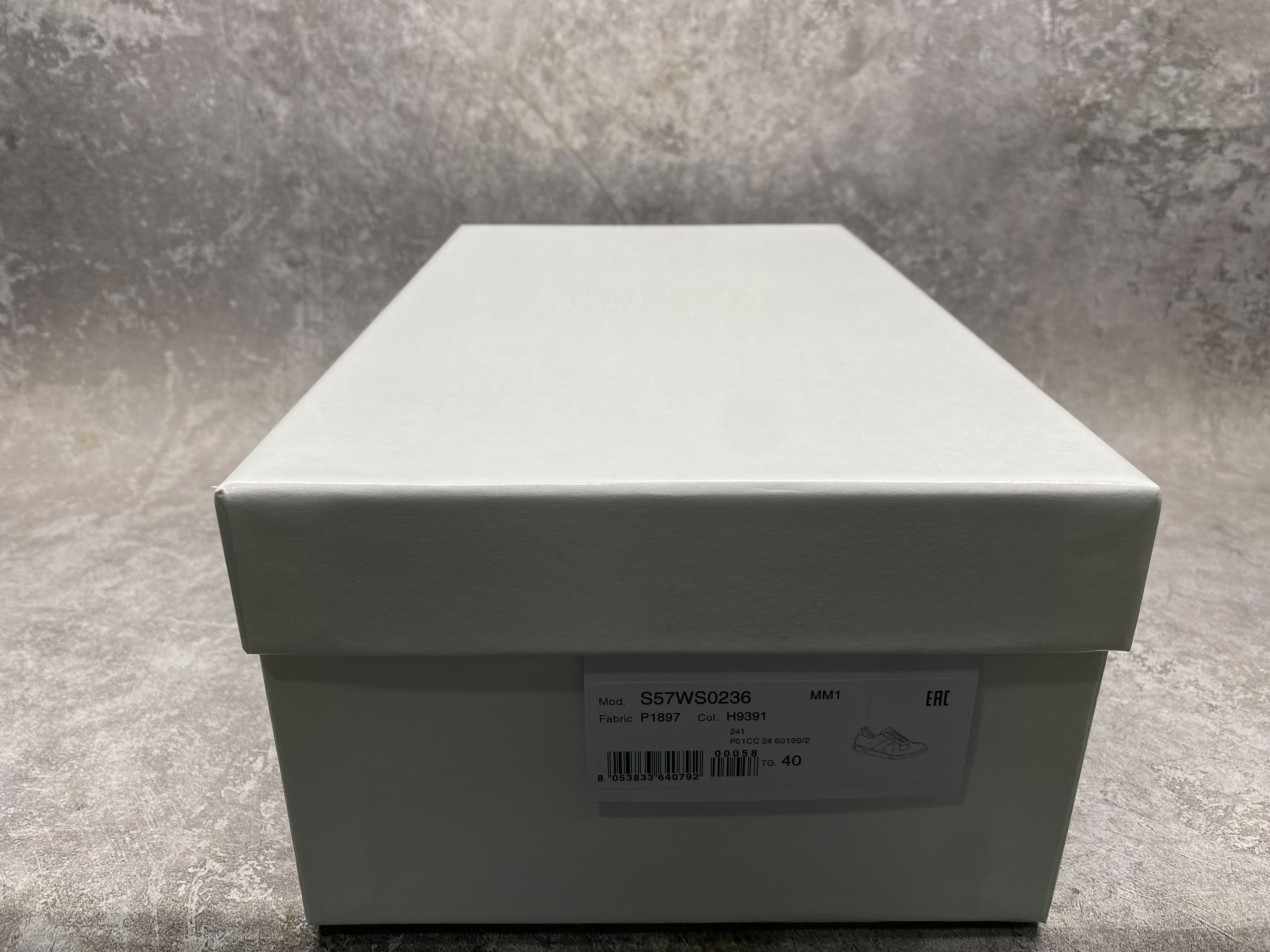 ua ma*s*n Ma*i*la mm6 sneakers