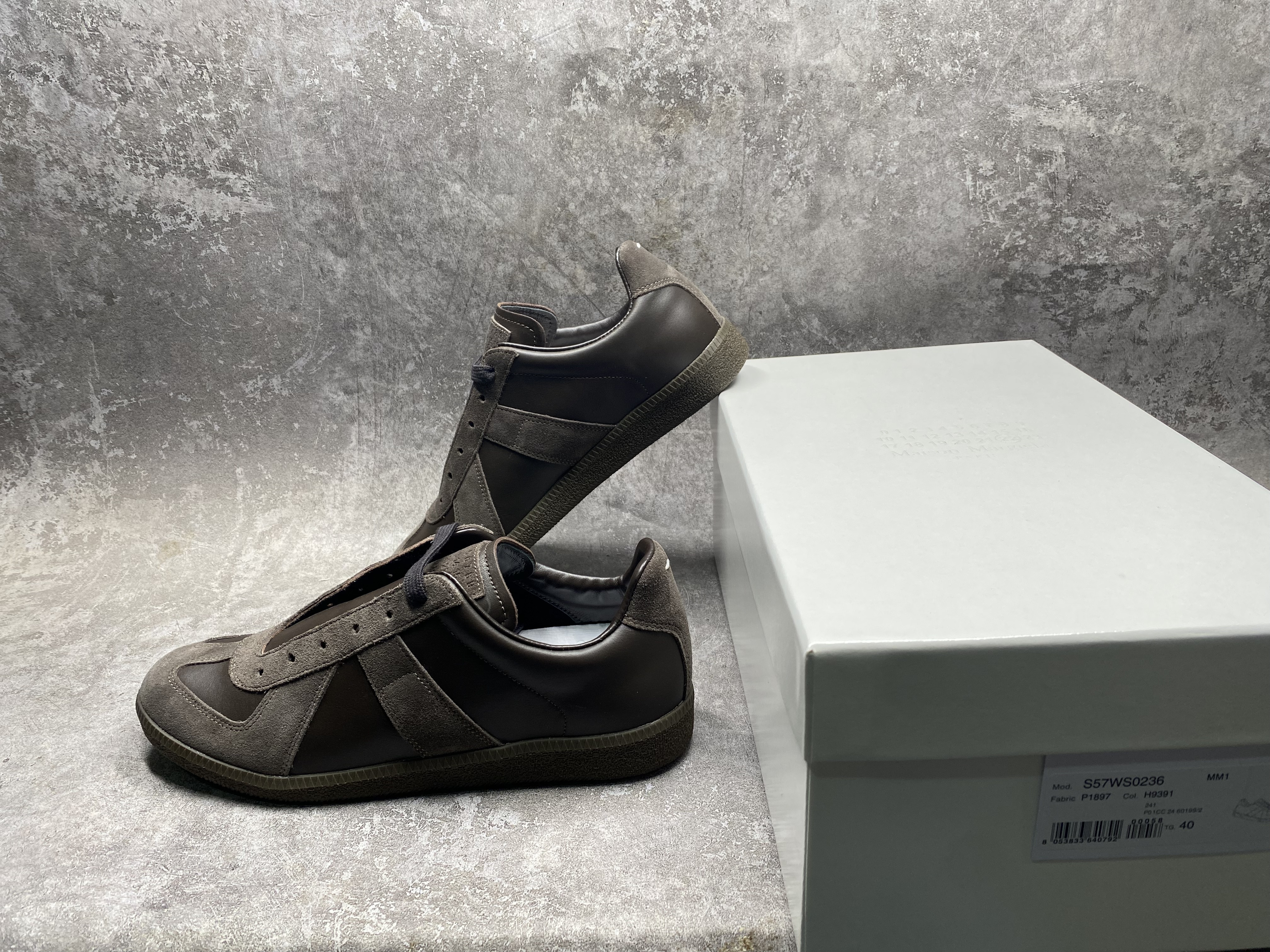 ua ma*s*n Ma*i*la mm6 sneakers