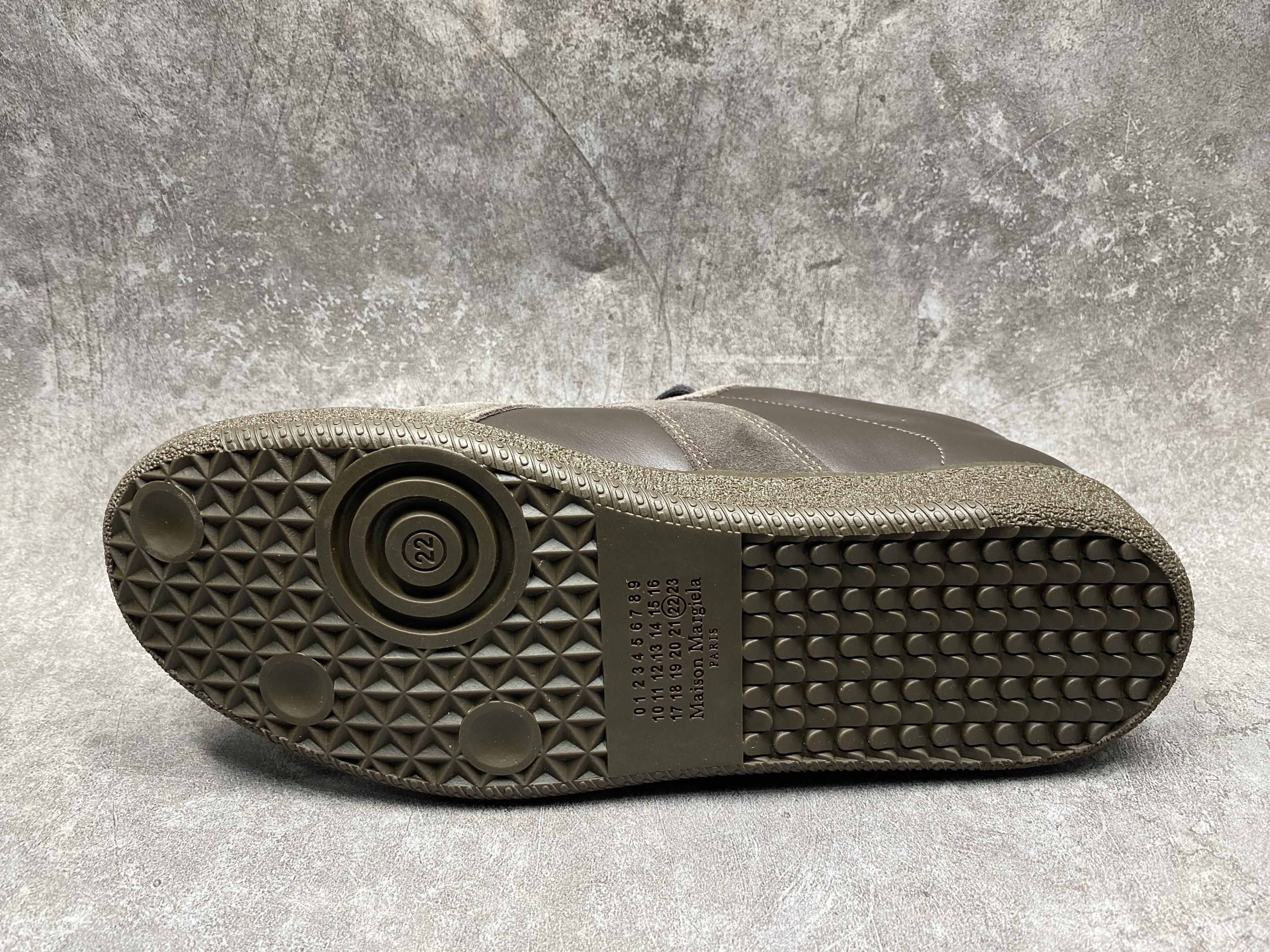 ua ma*s*n Ma*i*la mm6 sneakers
