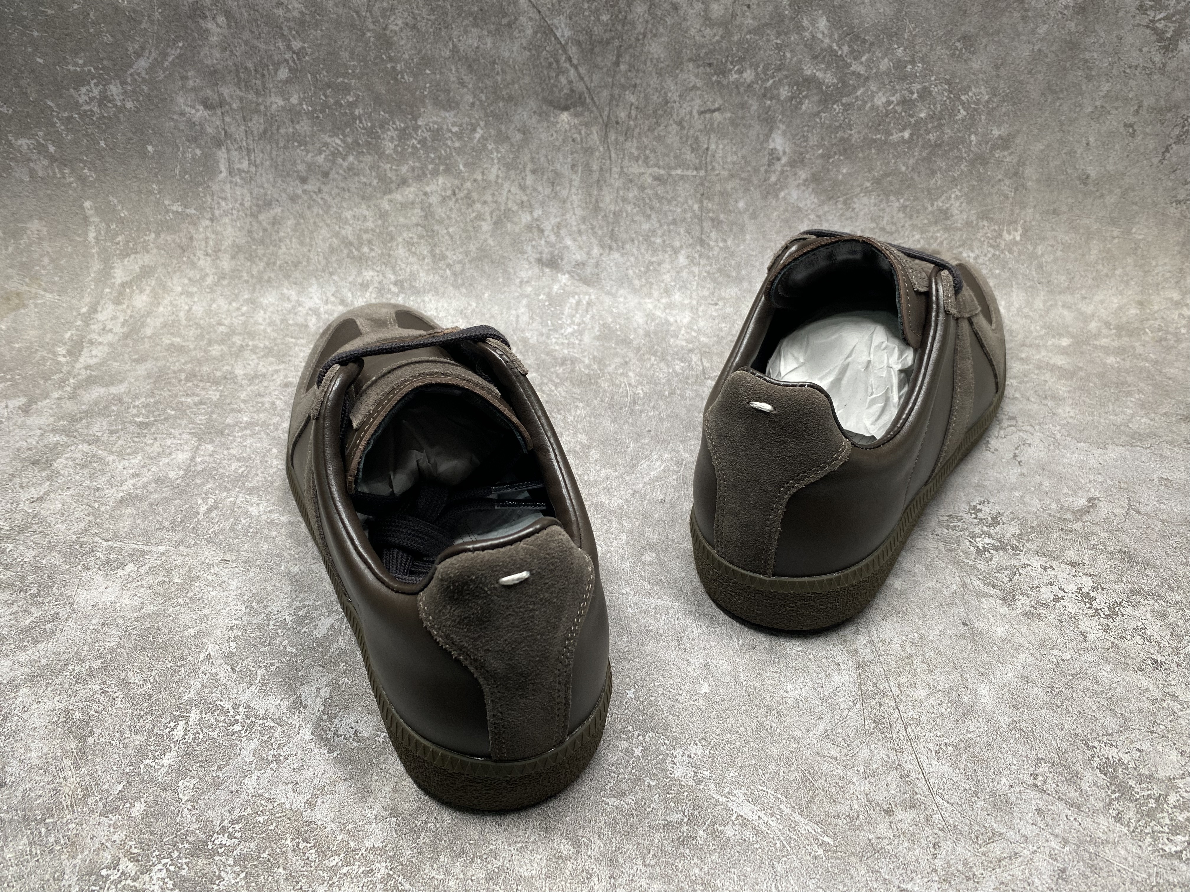 ua ma*s*n Ma*i*la mm6 sneakers