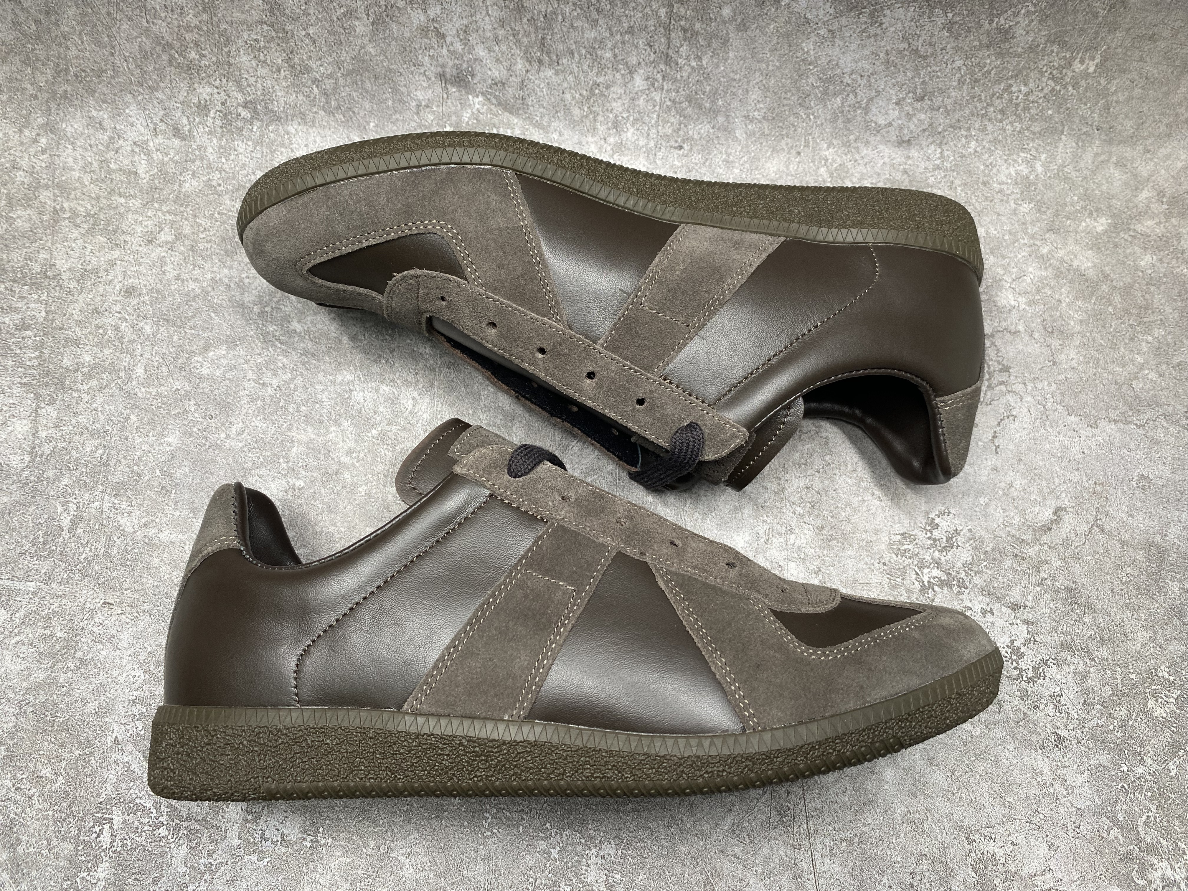 ua ma*s*n Ma*i*la mm6 sneakers
