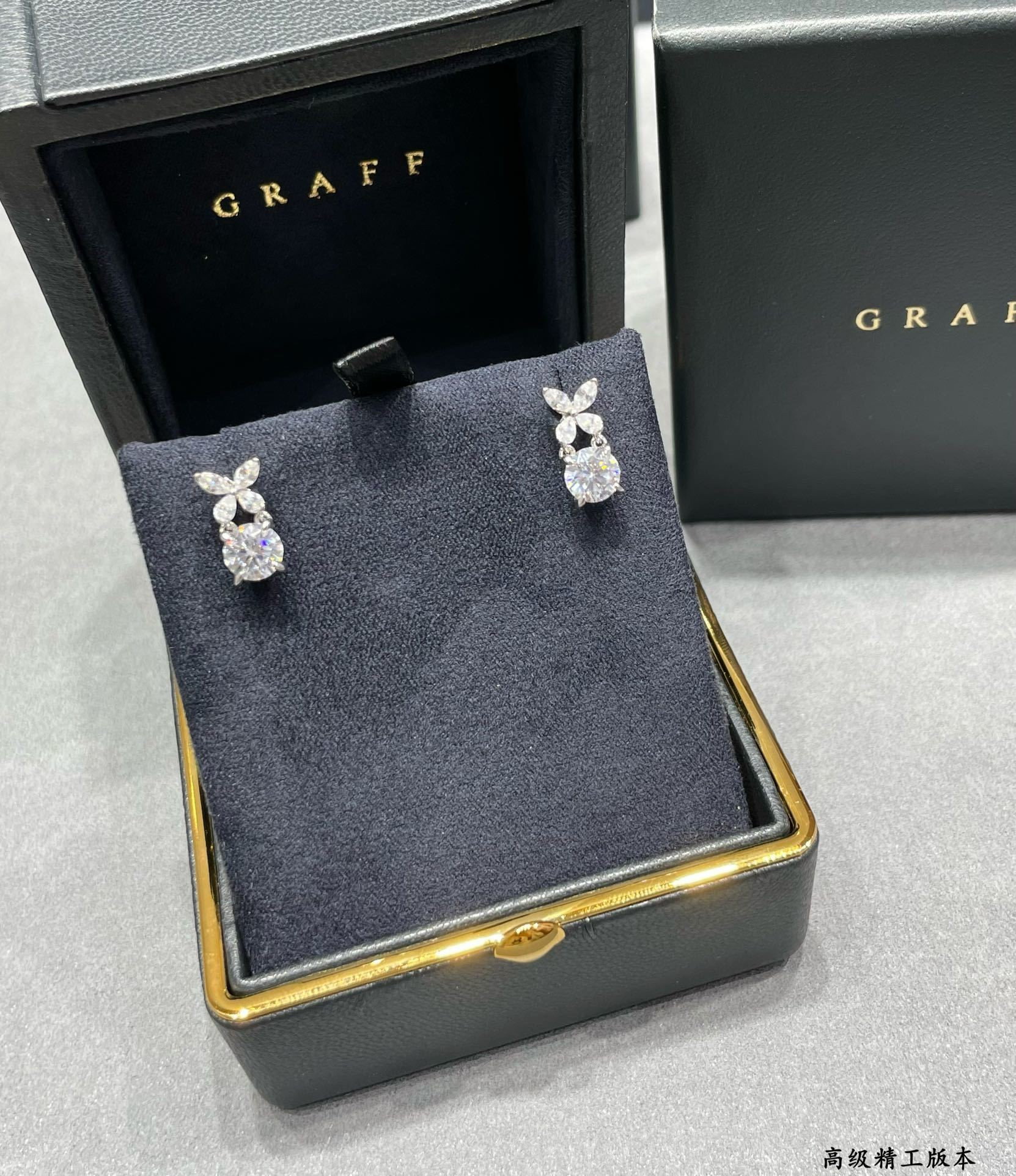 Gr*ff di*m*nd-encrusted butterfly stud earrings