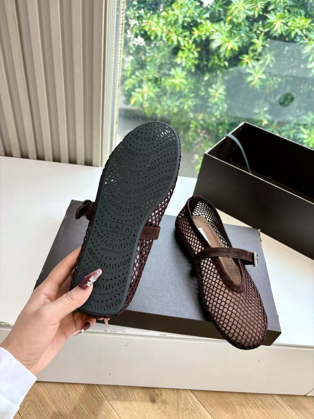 UA ALAÏA BALLET FLATS IN FISHNET