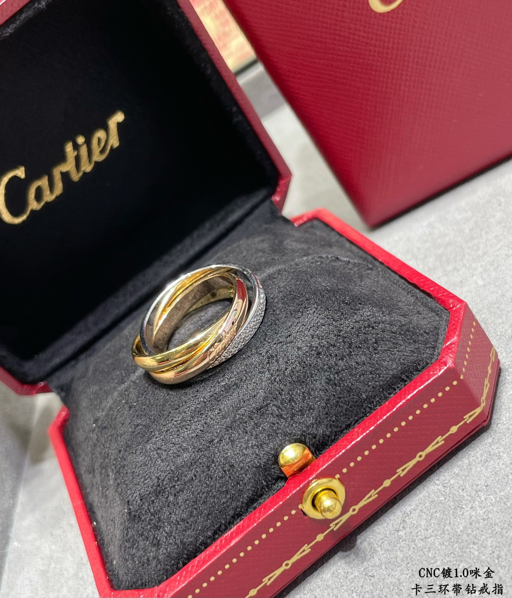 Ca*t*er three-band diamond ring