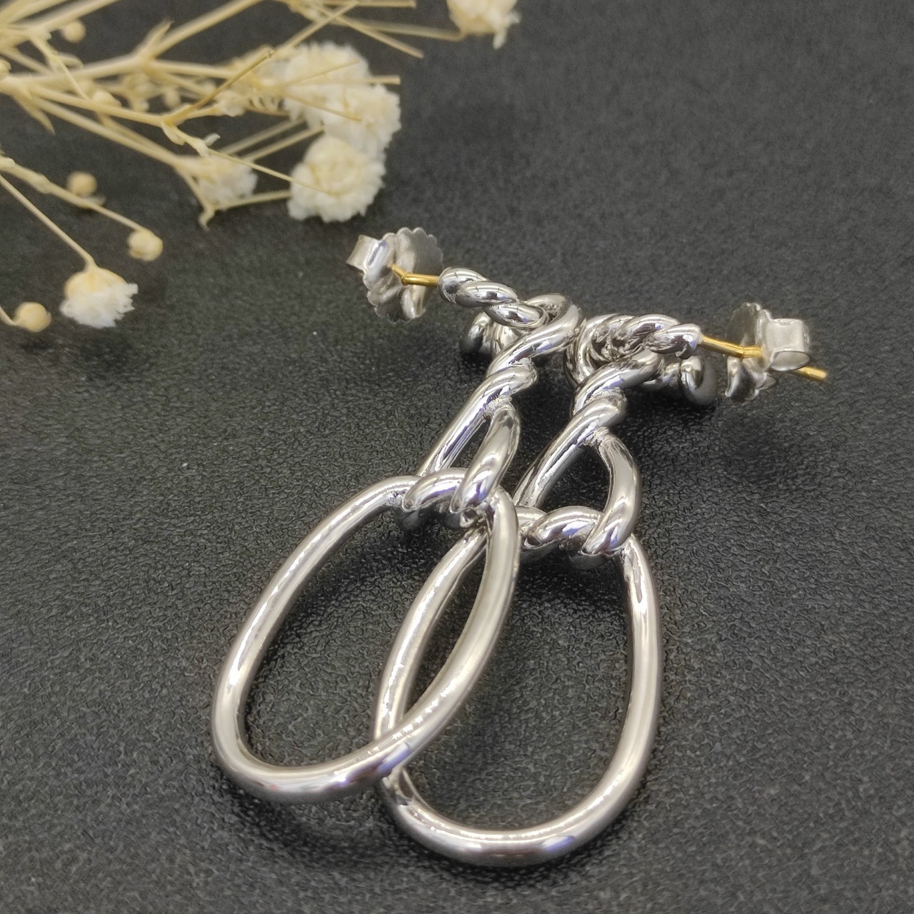 dau1d Yvrm*n twisted figure 8 earrings