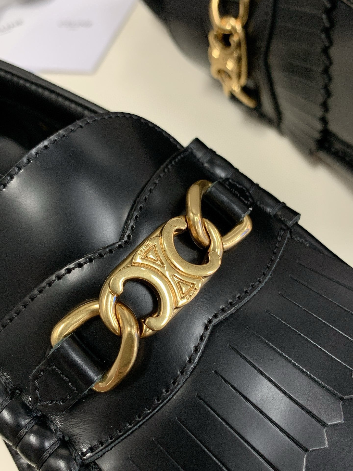 ua Ce**e margaret triomphe chain loafers