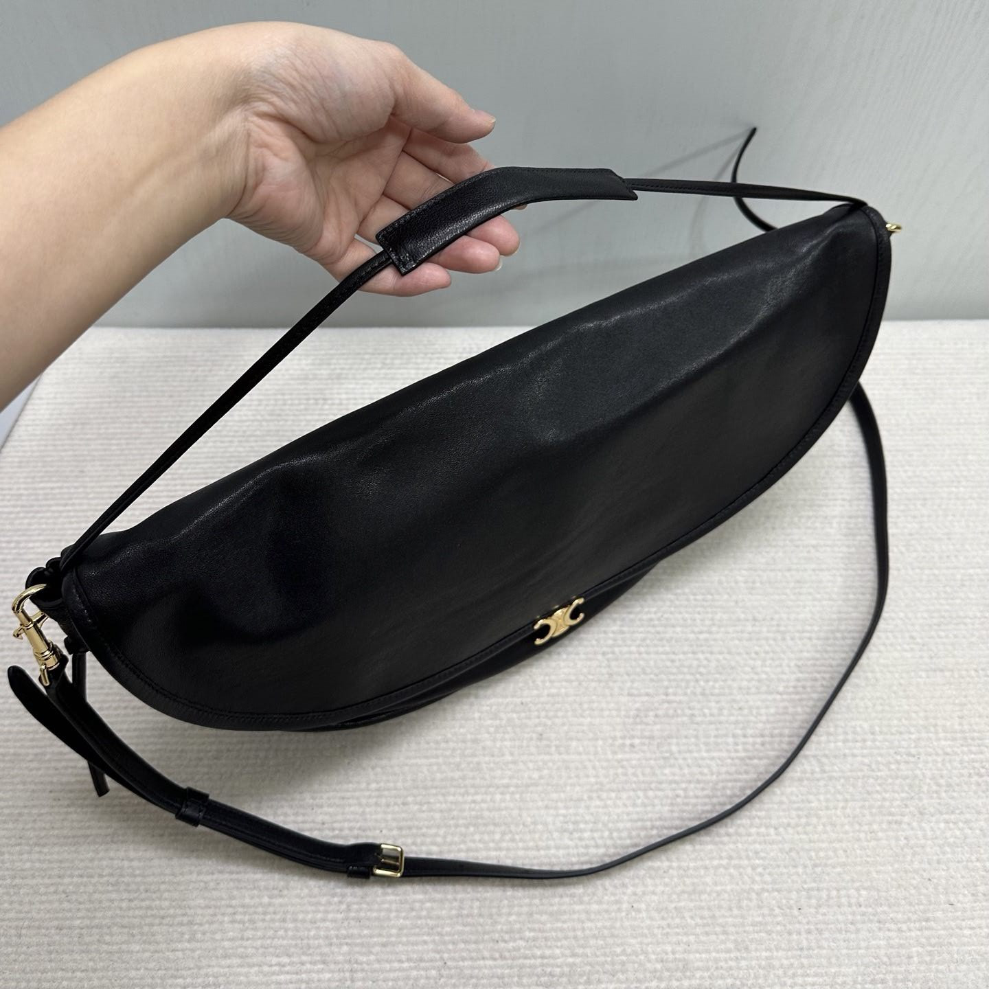 ce**e halfmoon soft triomphe bag in S*pple shiny lambskin 46x19x10cm