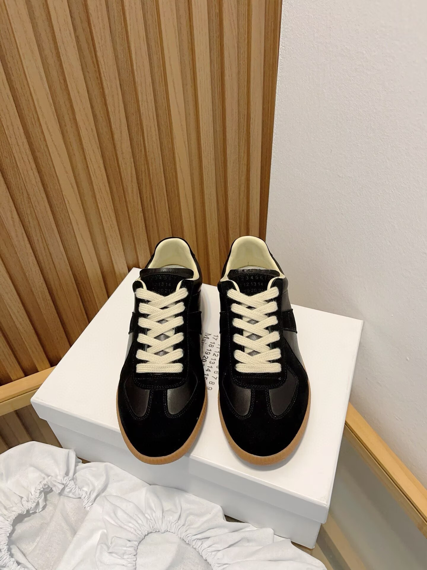 ua ma*s*n Ma*i*la mm6 black sneakers