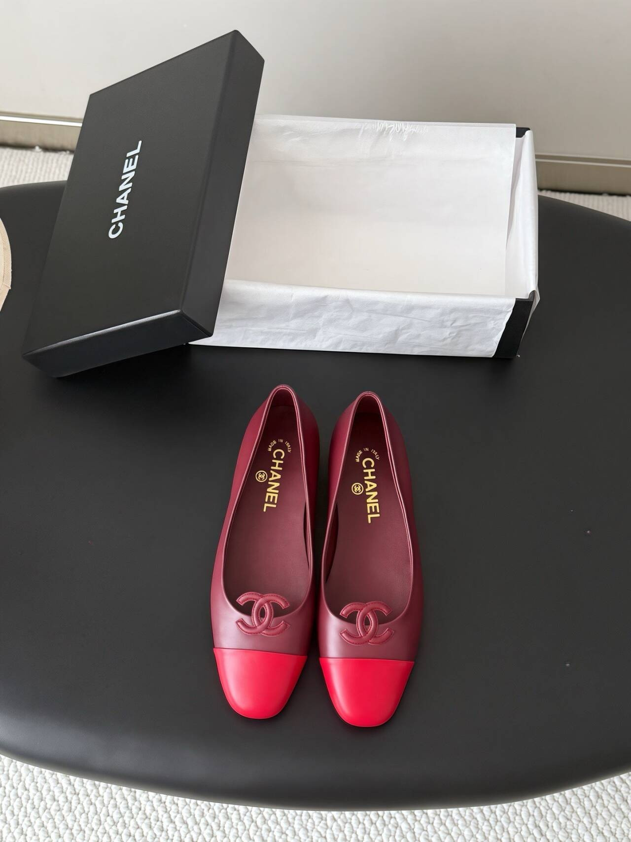 ua Ch*el leather ballet flats
