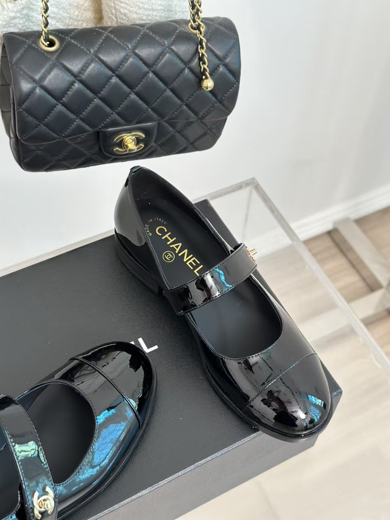 ua Ch*el patent mary janes