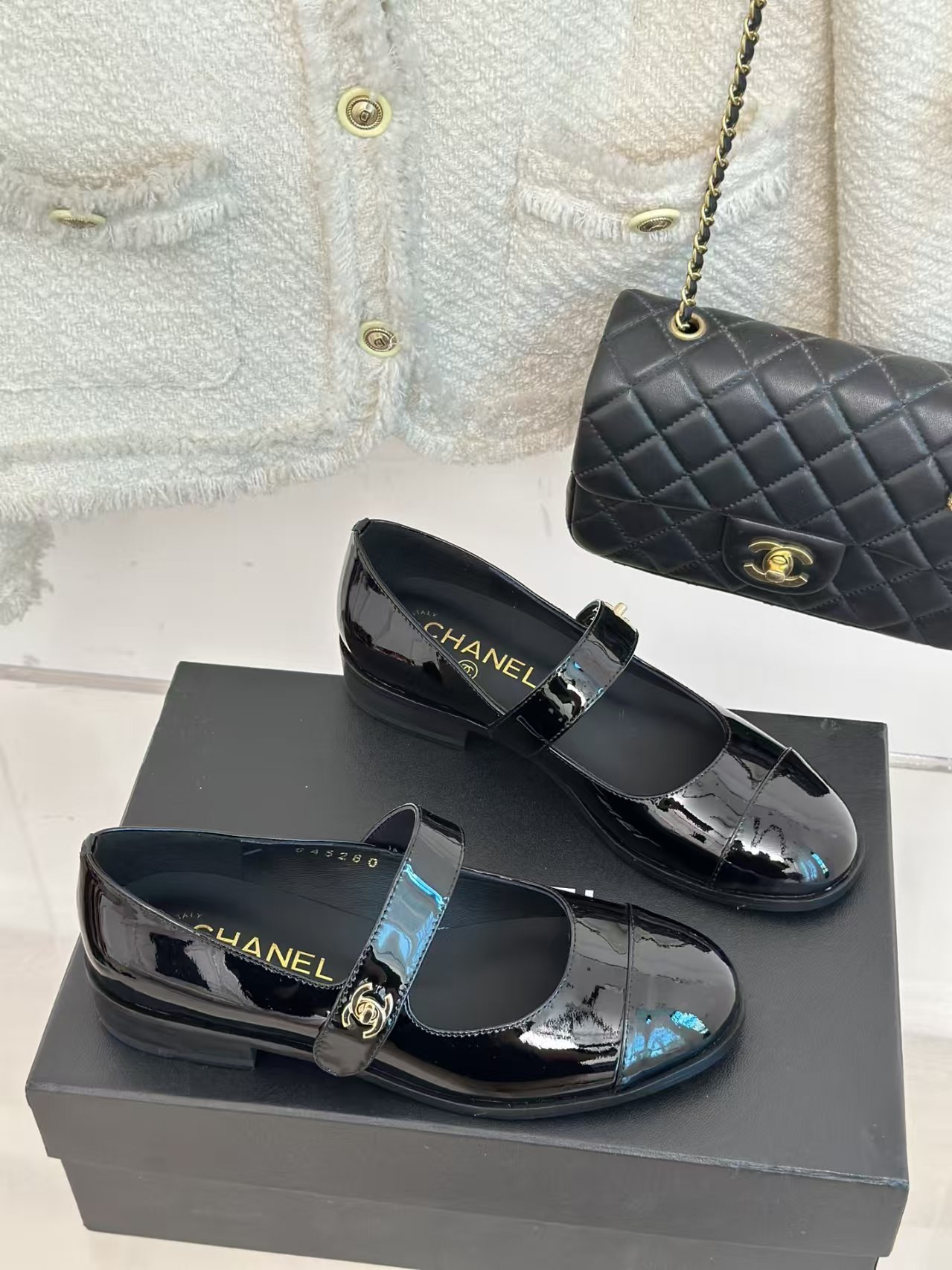 ua Ch*el patent mary janes