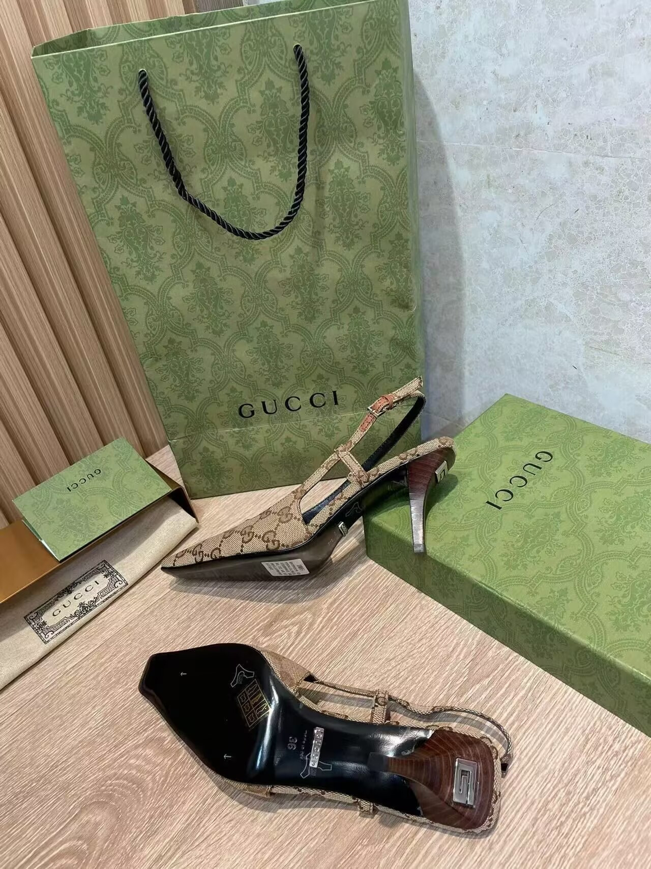 UA G*u*i GG Slingback Pump