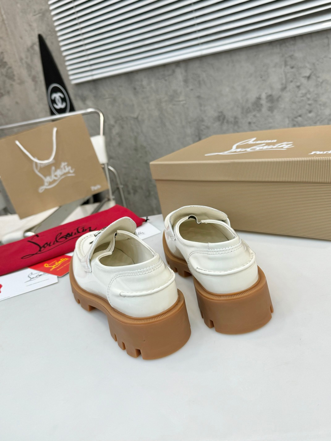 UA Ch**an Louboutin(CL) logo design,the latest runway version of the red-soled shoes