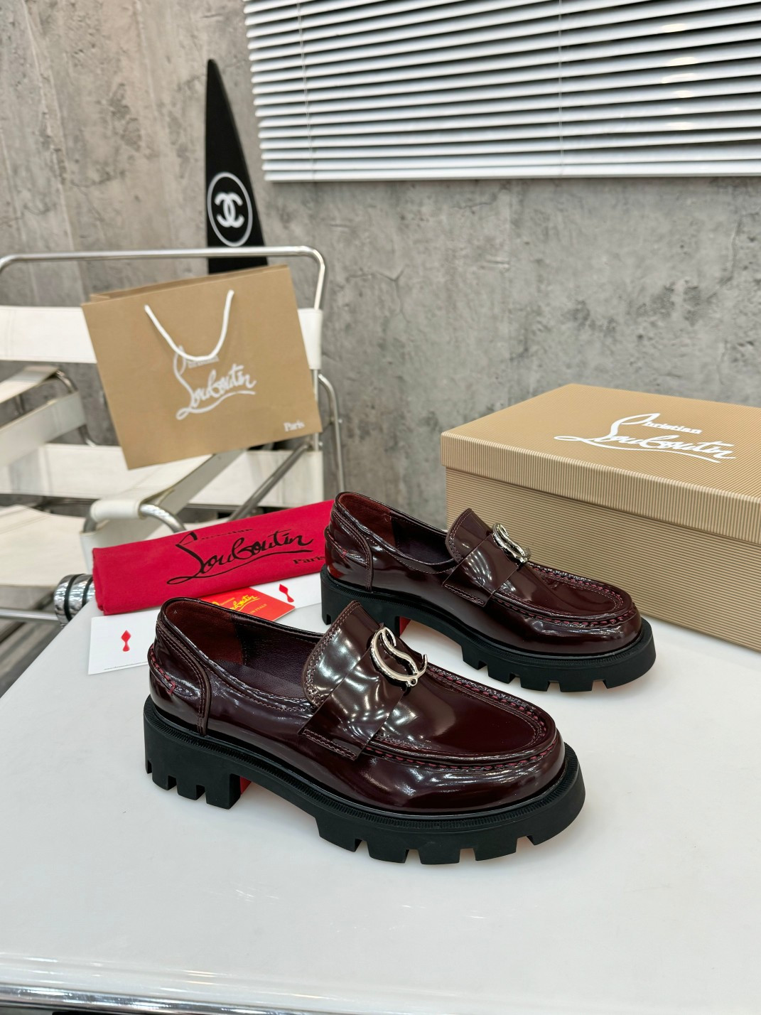 UA Ch**an Louboutin(CL) logo design,the latest runway version of the red-soled shoes