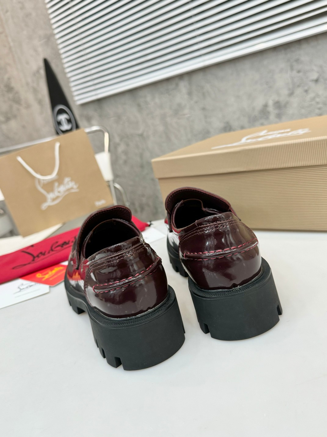UA Ch**an Louboutin(CL) logo design,the latest runway version of the red-soled shoes