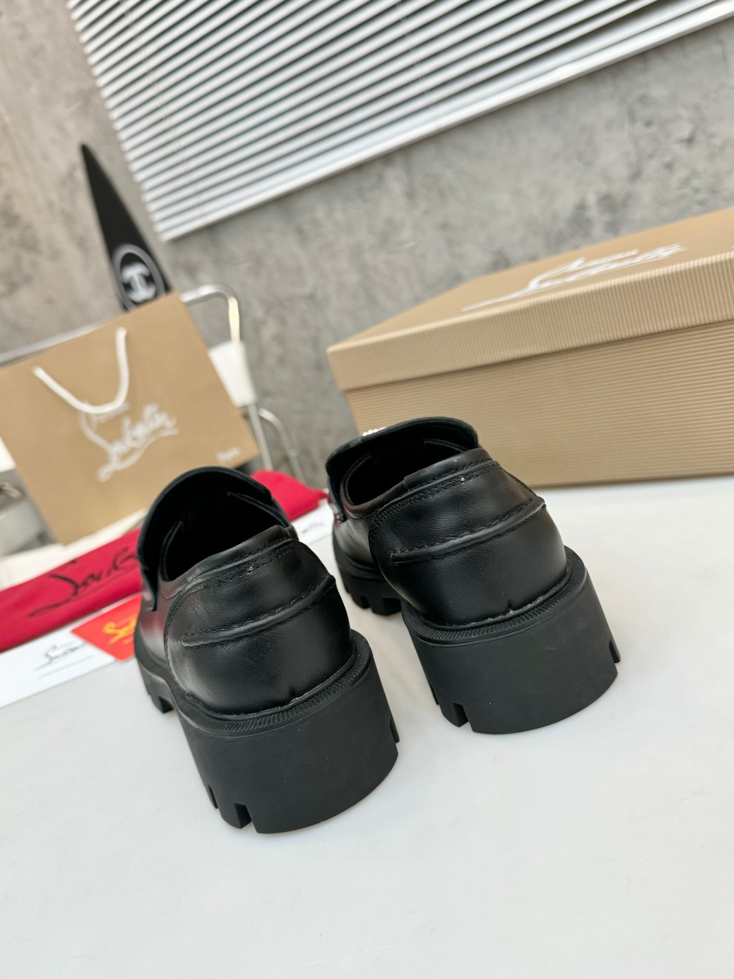 UA Ch**an Louboutin(CL) logo design,the latest runway version of the red-soled shoes