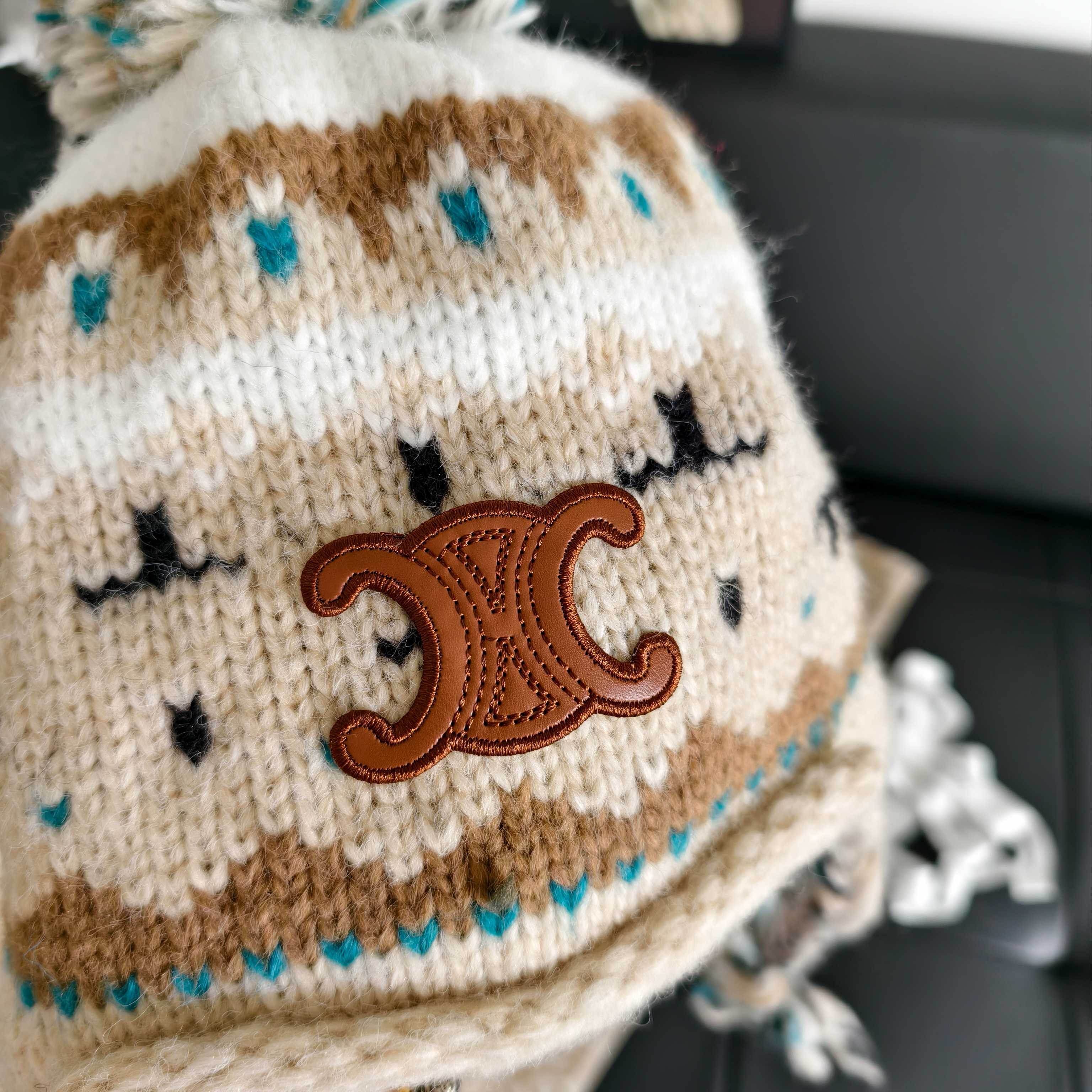 Ce**e knit trapper hat