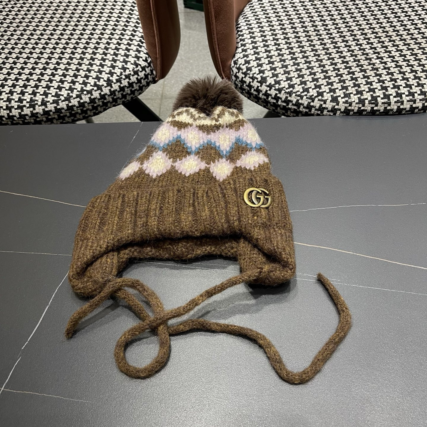 G*u*i knit trapper hat