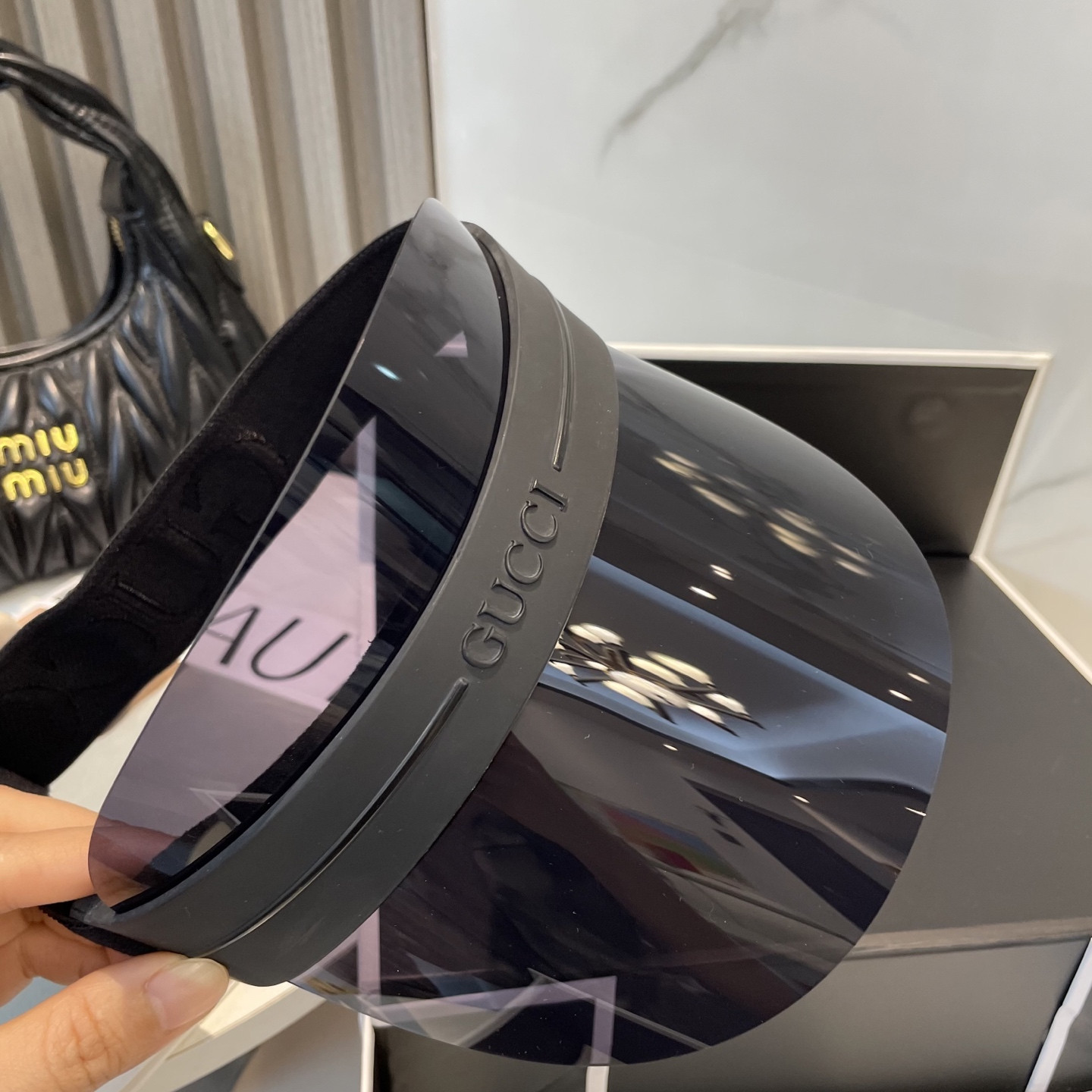 G*u*i visor hat