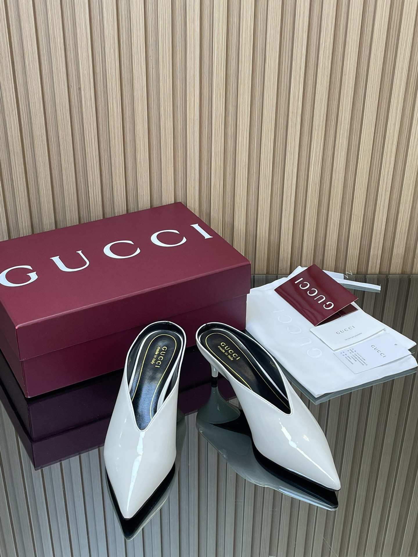 ua G*u*i 97 heeled mule