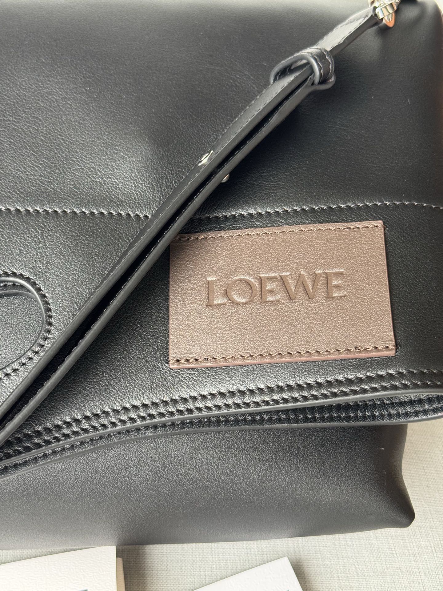l0ew* bob folded tote in shiny S*pple calfskin