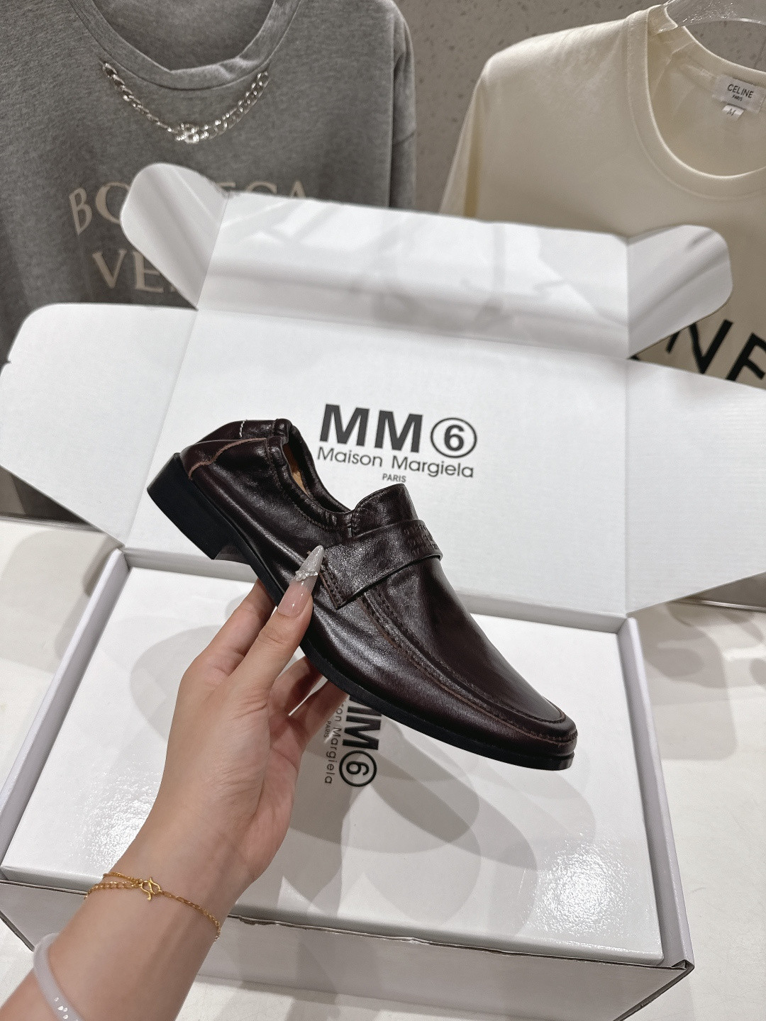 ua ma*s*n Ma*i*la swing-toe leather loafers