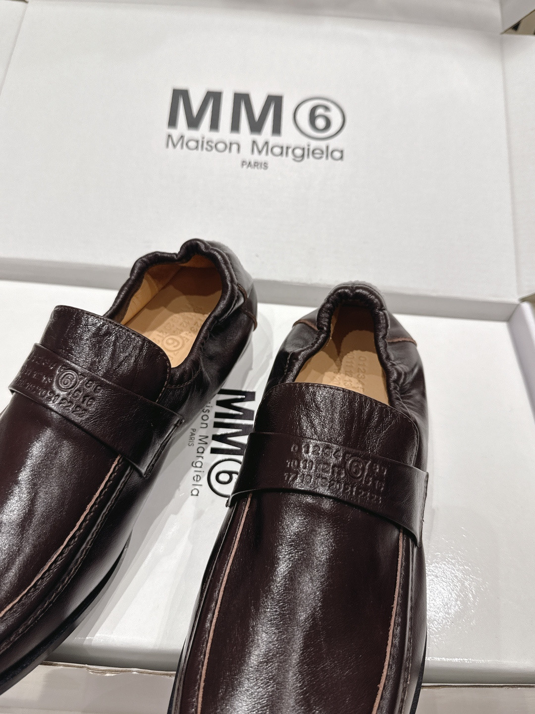 ua ma*s*n Ma*i*la swing-toe leather loafers